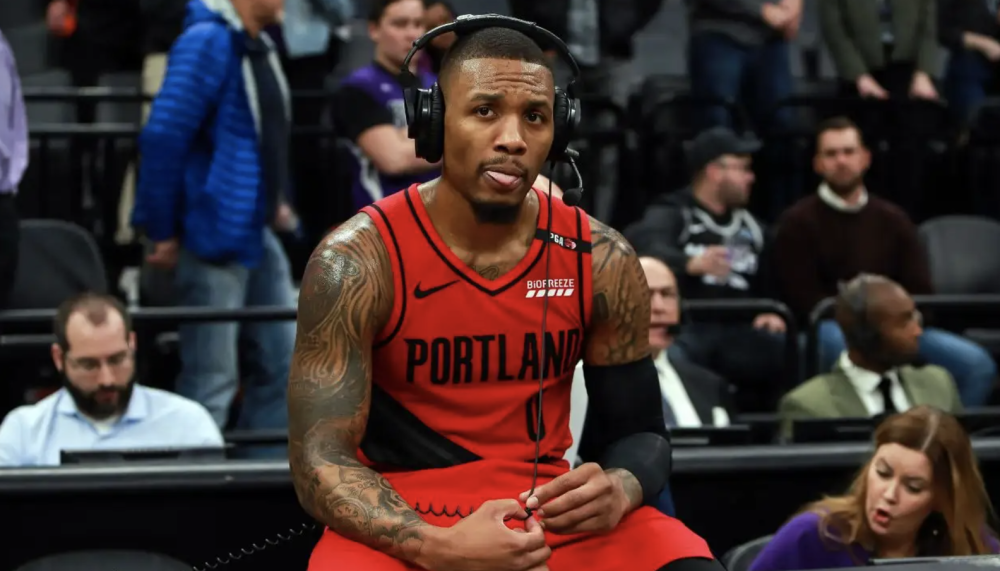 他以低于标 他以低于标